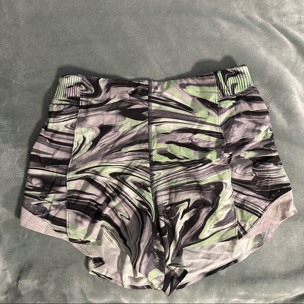 Green, grey & black patterned lululemon shorts. Find you pace 3in style. Size 10